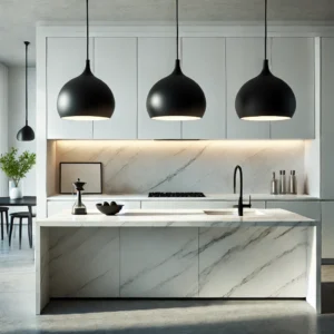 A modern minimalist kitchen with sleek black pendant lights above a white marble island, showcasing contemporary design.