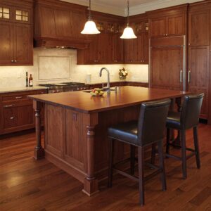 Spacious kitchen island with Cherry Kitchen Units and seating area.