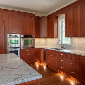 Cherry Kitchen Units complemented by a light-colored worktop.