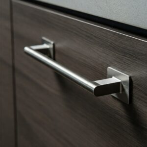 Close-up view of modern stainless steel cabinet pulls adding a contemporary touch to kitchen drawers. modern kitchen cabinet hardware