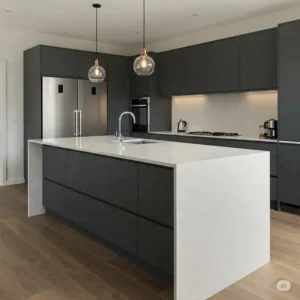 Modern kitchen with a sleek curved kitchen island featuring a light countertop and dark cabinetry.