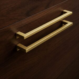Modern black Modern Kitchen Cabinet Pulls contrasting with white shaker style cabinets.