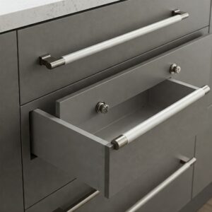 Different hardware choices like pulls and knobs installed on frameless kitchen cabinets doors and drawers.