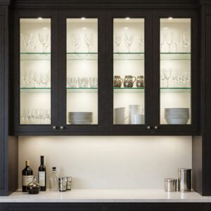 Stylish Inset Kitchen Cabinets with glass door inserts, adding visual interest and display space.