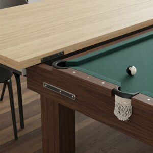 Close-up view of the easy conversion mechanism of a pool table kitchen table, transforming it from dining to gaming.