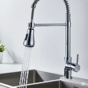 Detail view of a chrome pull-down kitchen faucet, showcasing its sprayer function, a key feature in many kitchen sink and faucet combo.
