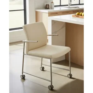 Stylish kitchen chair with rollers seamlessly integrated into a contemporary kitchen, offering both comfort and functionality.
