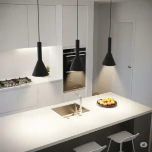 Sophisticated black matte modern pendant lighting for kitchen island suspended above a white kitchen island, offering a striking contrast and a touch of modern elegance.