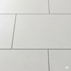 Close-up view of subtle texture on matte white kitchen floor tiles, ideal for slip resistance and easy cleaning.