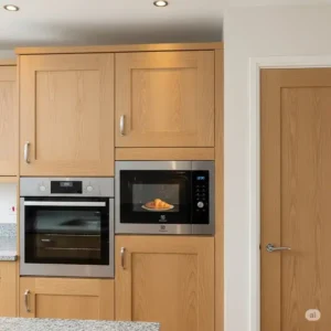 Electrolux kitchen appliances: A built-in microwave oven seamlessly integrated into kitchen cabinetry.