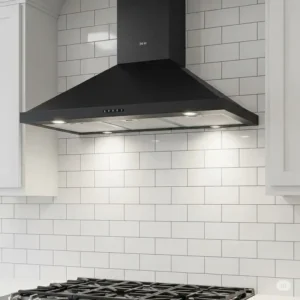 A sophisticated black matte 36 inch kitchen hood providing a striking contrast against a white tile backsplash.