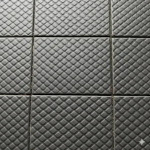A close-up view of textured, anti-slip commercial kitchen tile designed for wet environments.