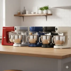 A set of Bosch kitchen mixers displayed in multiple stylish colors like red, silver, and blue on a modern countertop. 