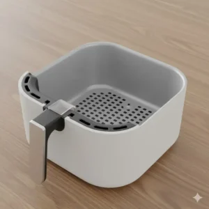 Image of a ceramic-coated basket from an air fryer without teflon, providing a non-toxic, non-stick surface.