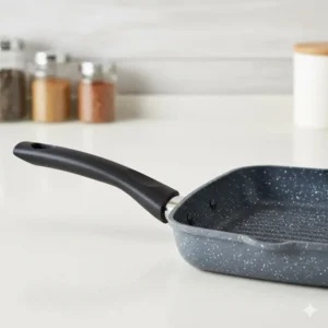 An ergonomic and heat-resistant handle attached to a high-quality ceramic grill pan.