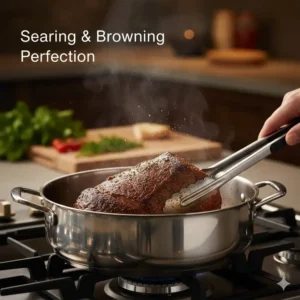 Searing a large beef roast to a perfect golden brown inside a dutch oven stainless steel pot.