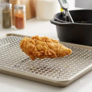"Crispy fried chicken lifted from oil cooked at the best cooking temperature for frying foods to prevent greasiness."